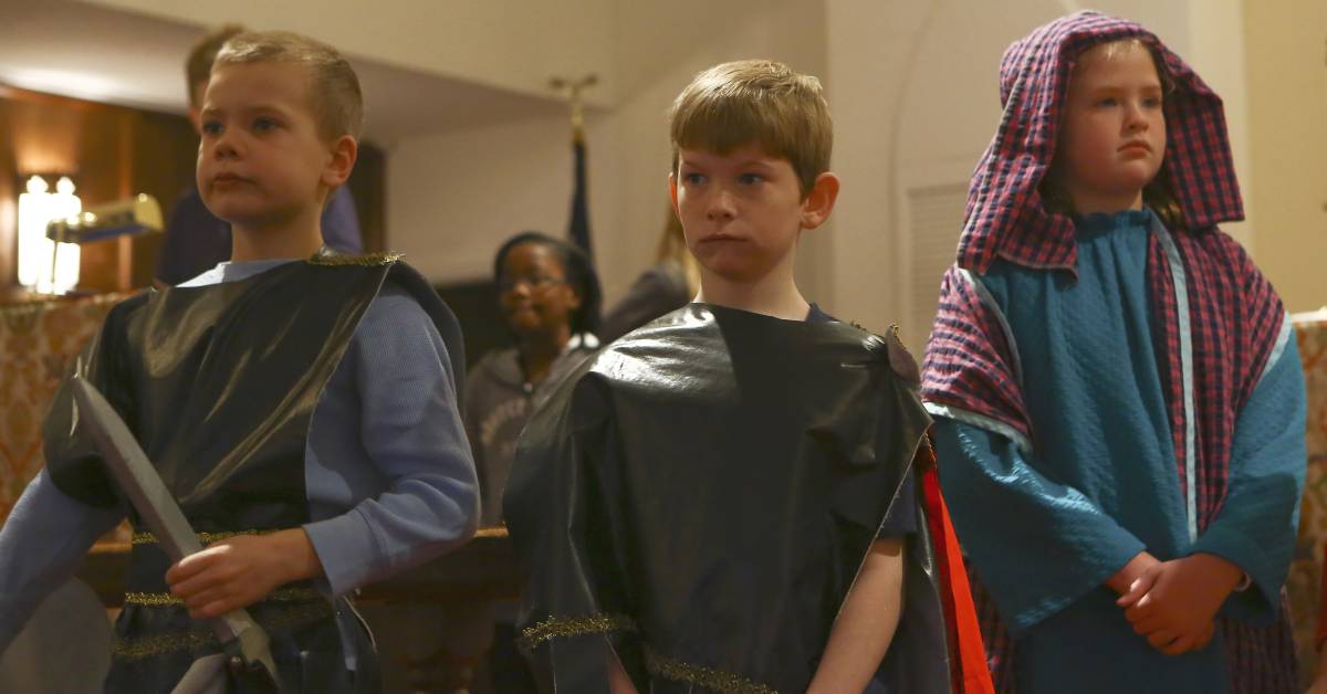 Three children enacting an Epiphany pageant