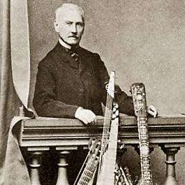 A photograph of Napoléon Coste in Paris with his guitars.
